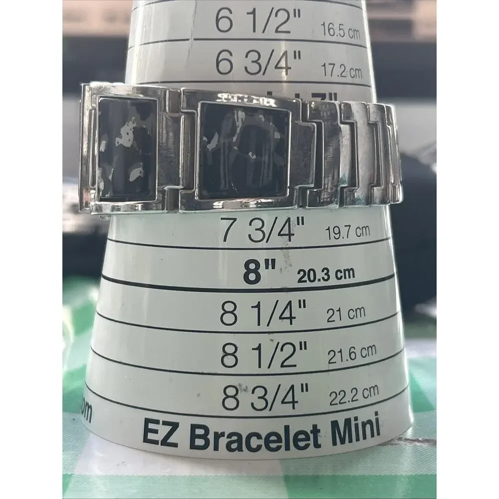 Geneva Silver Tone Black And Silver Camo Band Women’s Quartz Watch